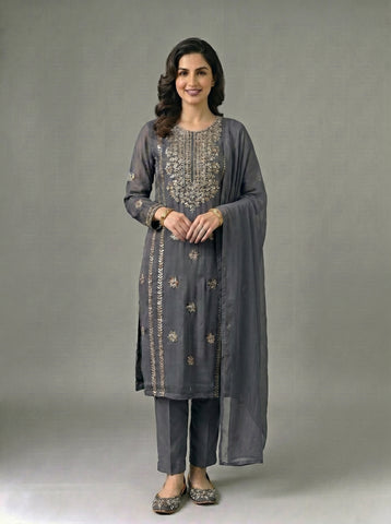 A beautifully crafted three-piece  suit, handmade with intricate gota work for an elegant, traditional finish....