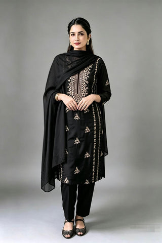 A beautifully crafted three-piece  suit, handmade with intricate gota work for an elegant, traditional finish....