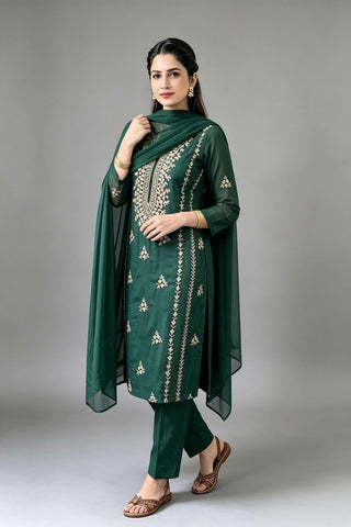 A beautifully crafted three-piece  suit, handmade with intricate gota work for an elegant, traditional finish....