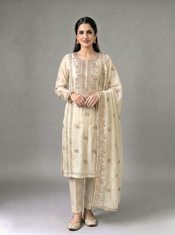 A beautifully crafted three-piece  suit, handmade with intricate gota work for an elegant, traditional finish....