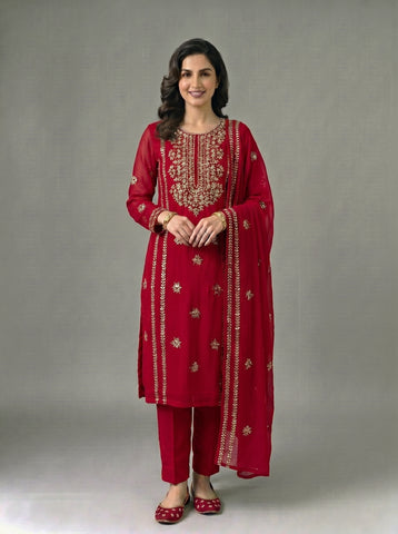 A beautifully crafted three-piece  suit, handmade with intricate gota work for an elegant, traditional finish....