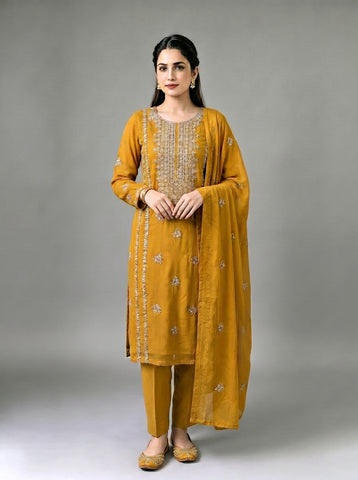 A beautifully crafted three-piece  suit, handmade with intricate gota work for an elegant, traditional finish....